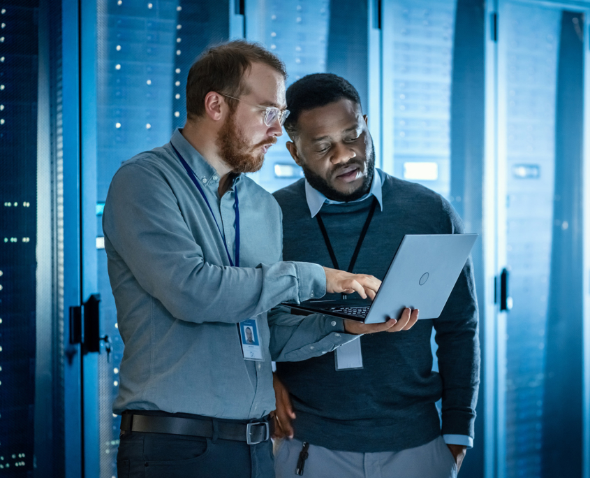 Two Tech Professionals In Data Center